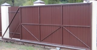 Купить откатные ворота из профнастила Южноуральск, цена от 1758 руб.