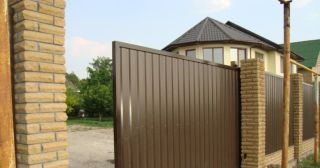 Купить откатные ворота из профнастила Южноуральск, цена от 1758 руб.